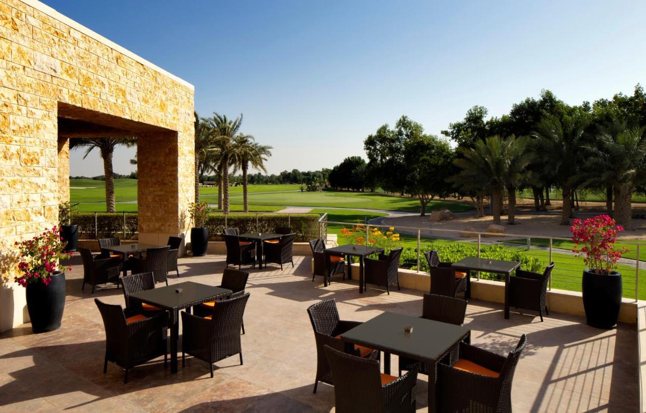 Vogo Abu Dhabi Golf Resort & Spa Formerly The Westin Abu Dhabi Golf Resort & Spa Exterior foto The clubhouse at the Dubai Creek Golf & Country Club
